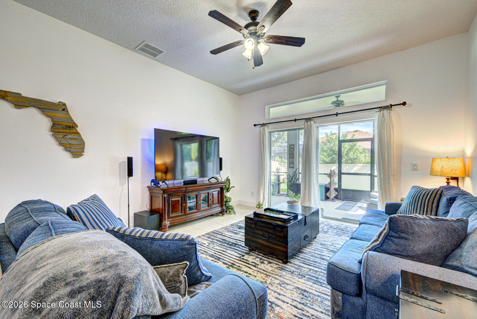 living room with slider to porch