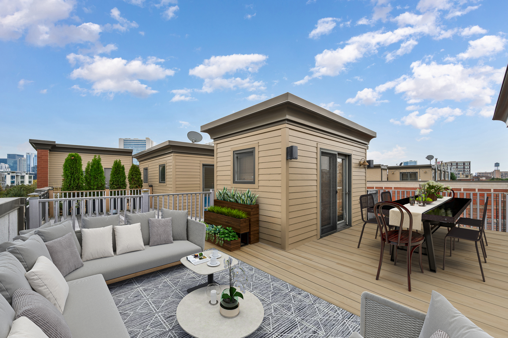 1036 North Crosby Street Chicago, IL 60610 - Photo 19 of 28 a view of a patio with couches table and chairs with wooden floor and fence