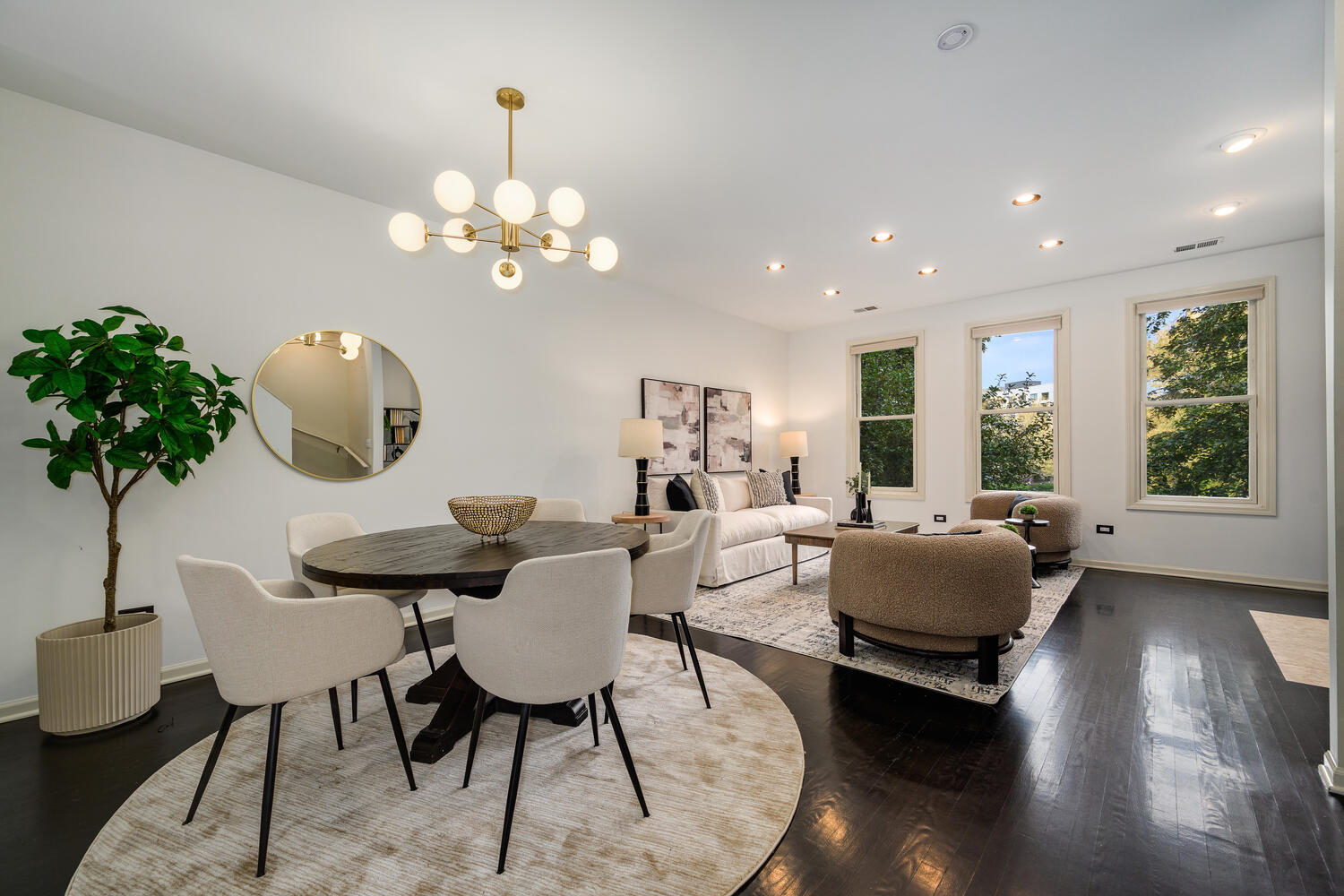 1036 North Crosby Street Chicago, IL 60610 - Photo 3 of 28 a living room with furniture potted plant and a chandelier