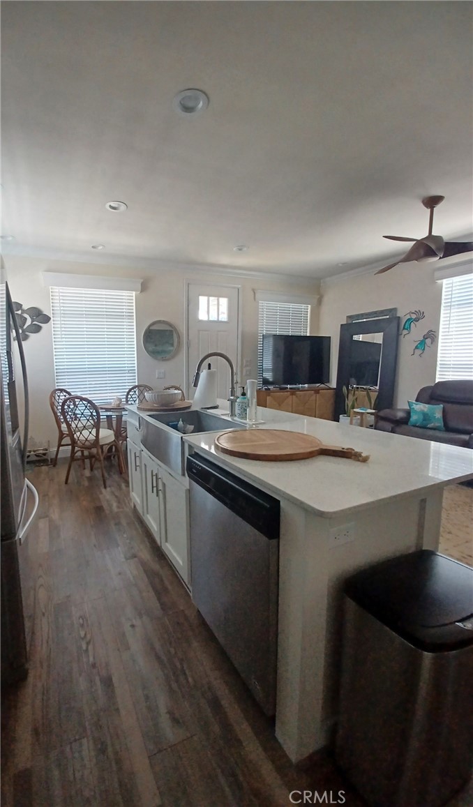 500 Atascadero Road Morro Bay, CA 93442 - Photo 12 of 45 a kitchen with stainless steel appliances granite countertop a sink a stove top oven a chimney and a counter top space