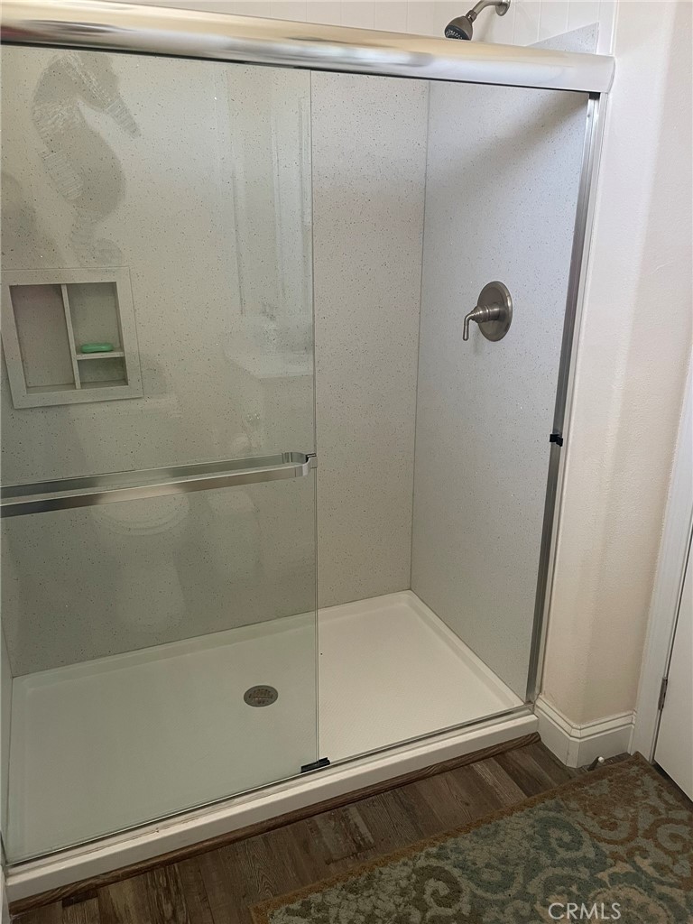 500 Atascadero Road Morro Bay, CA 93442 - Photo 15 of 45 a bathroom with a glass shower door