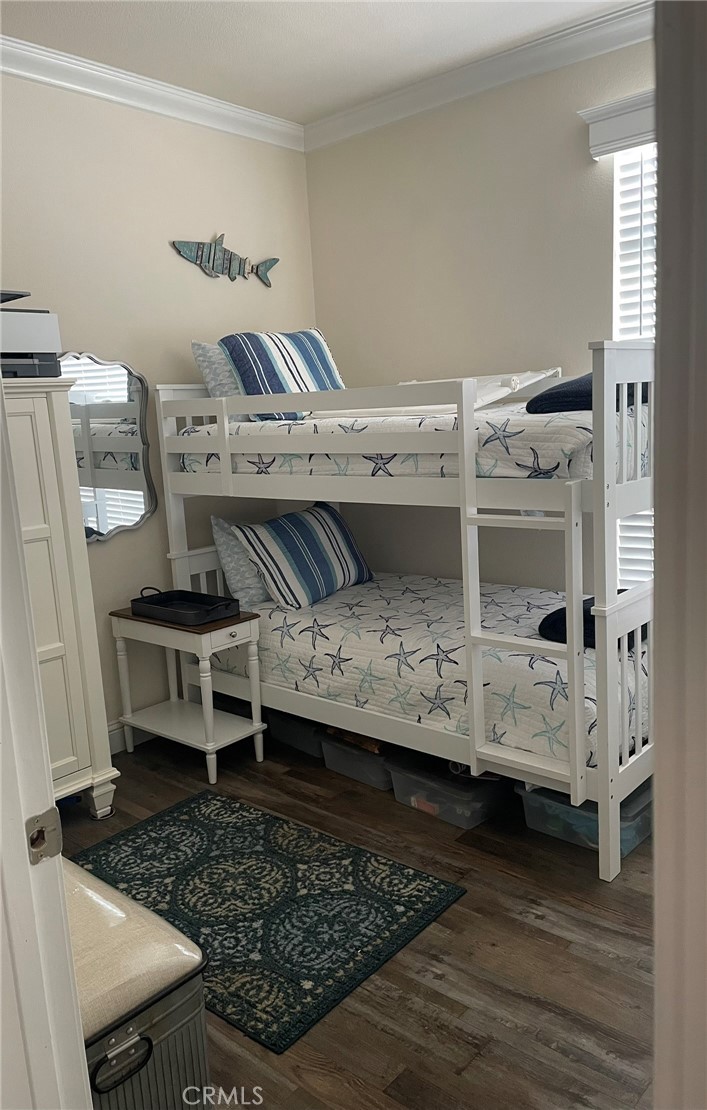 500 Atascadero Road Morro Bay, CA 93442 - Photo 24 of 45 a bed room with a bed and a view of kitchen