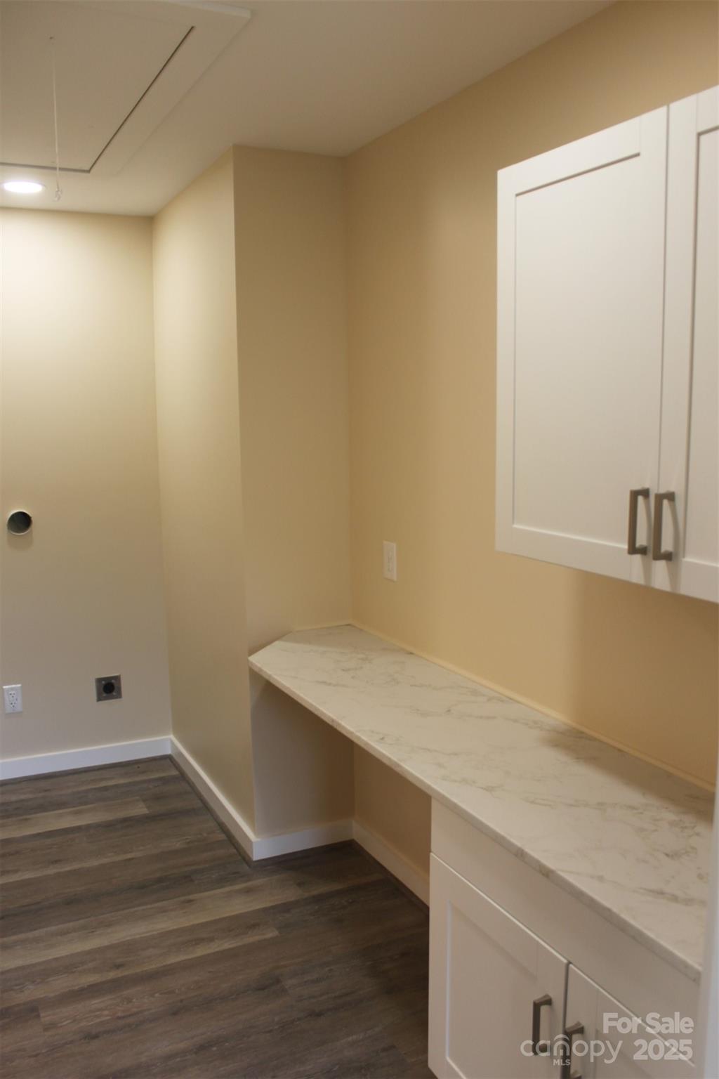 109 Blue Ridge Avenue Extension Elkin, NC 28621 - Photo 14 of 20 a room with a wooden floor and vanity