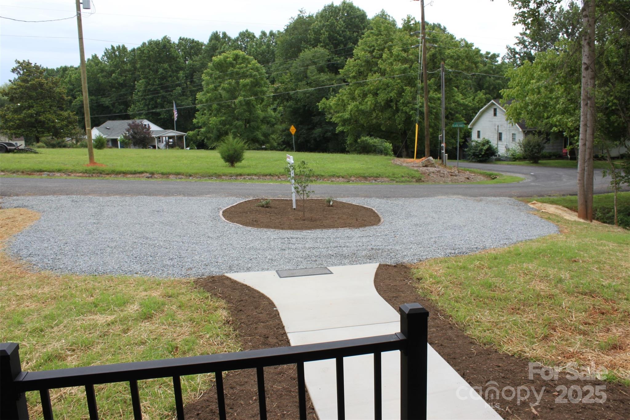 109 Blue Ridge Avenue Extension Elkin, NC 28621 - Photo 3 of 20 a view of a swimming pool with a patio