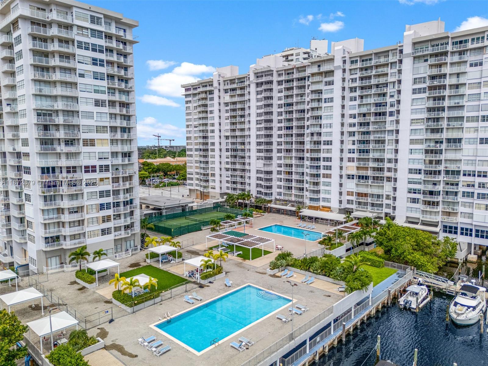 18071 Biscayne Boulevard, Unit PH04 & PH03 Aventura, FL 33160 - Photo 14 of 26 a view of a balcony with patio