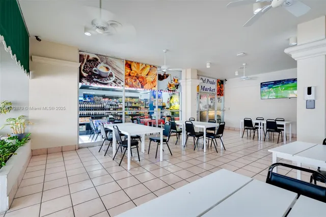 a view of a dining room with furniture