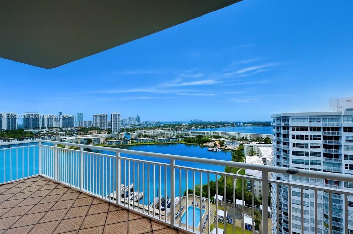 18071 Biscayne Boulevard, Unit PH04 & PH03 Aventura, FL 33160 - Photo 2 of 26 a view of a balcony with city view