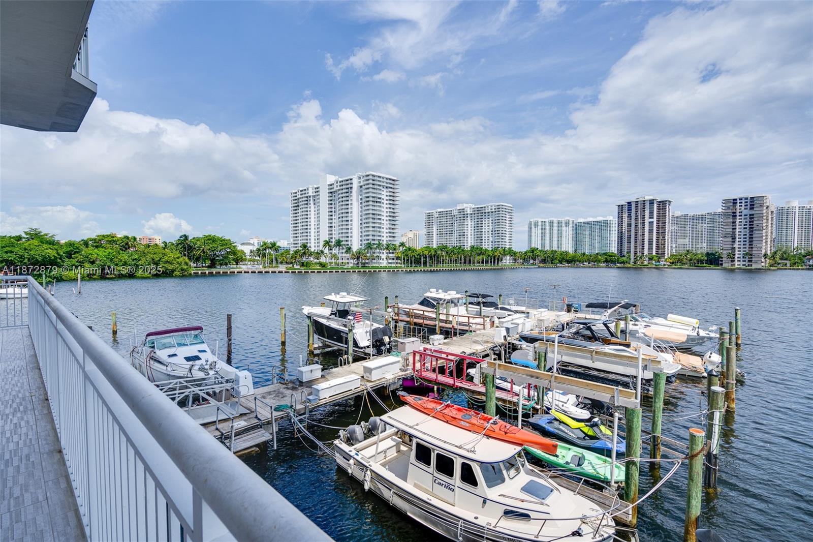 18071 Biscayne Boulevard, Unit PH04 & PH03 Aventura, FL 33160 - Photo 24 of 26 a view of roof deck with seating space and barbeque oven