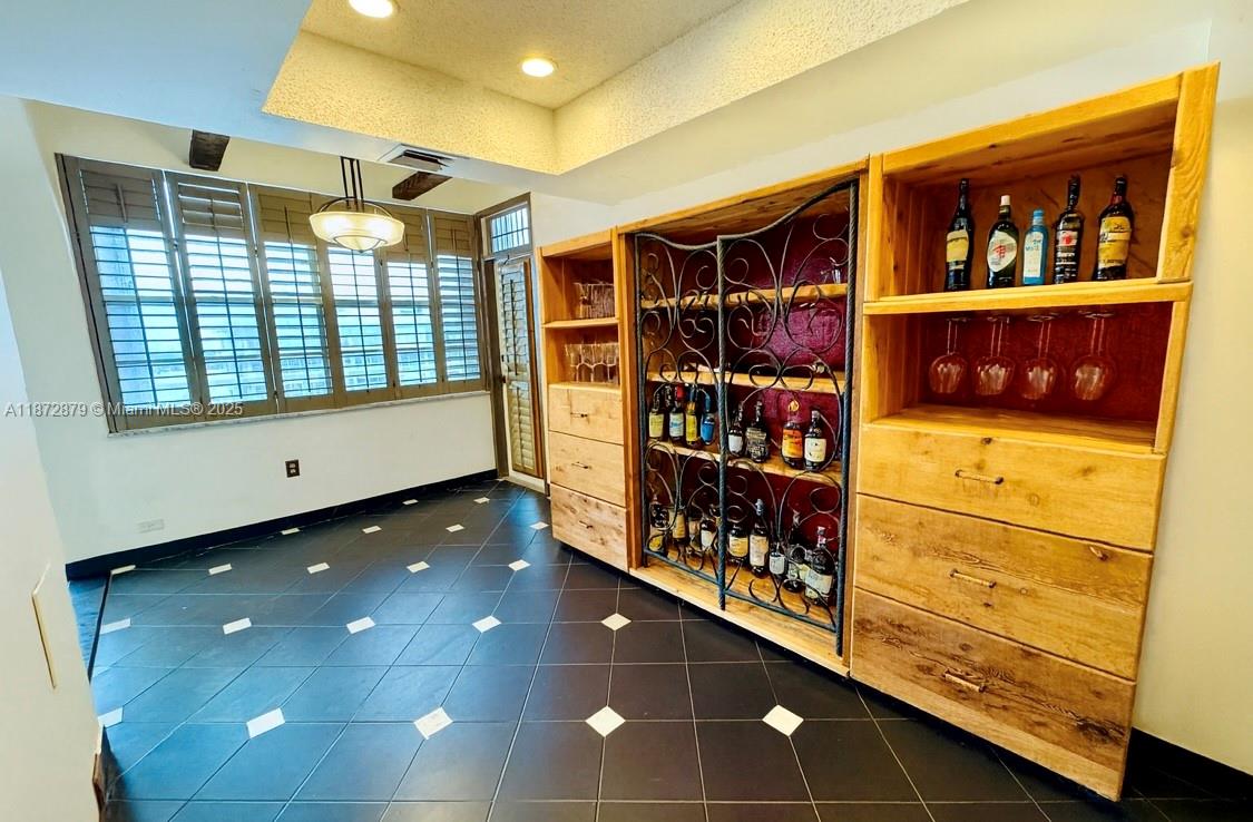 18071 Biscayne Boulevard, Unit PH04 & PH03 Aventura, FL 33160 - Photo 6 of 26 a view of walk in entryway with a cabinet