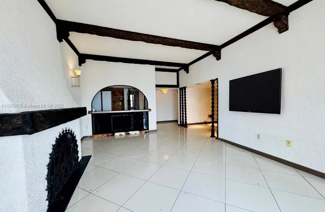 a view of entryway with stairs and wooden floor