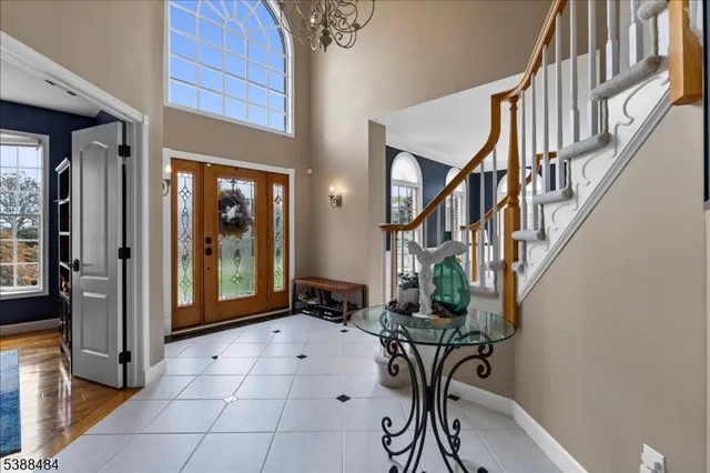 a view of an entryway with a front door