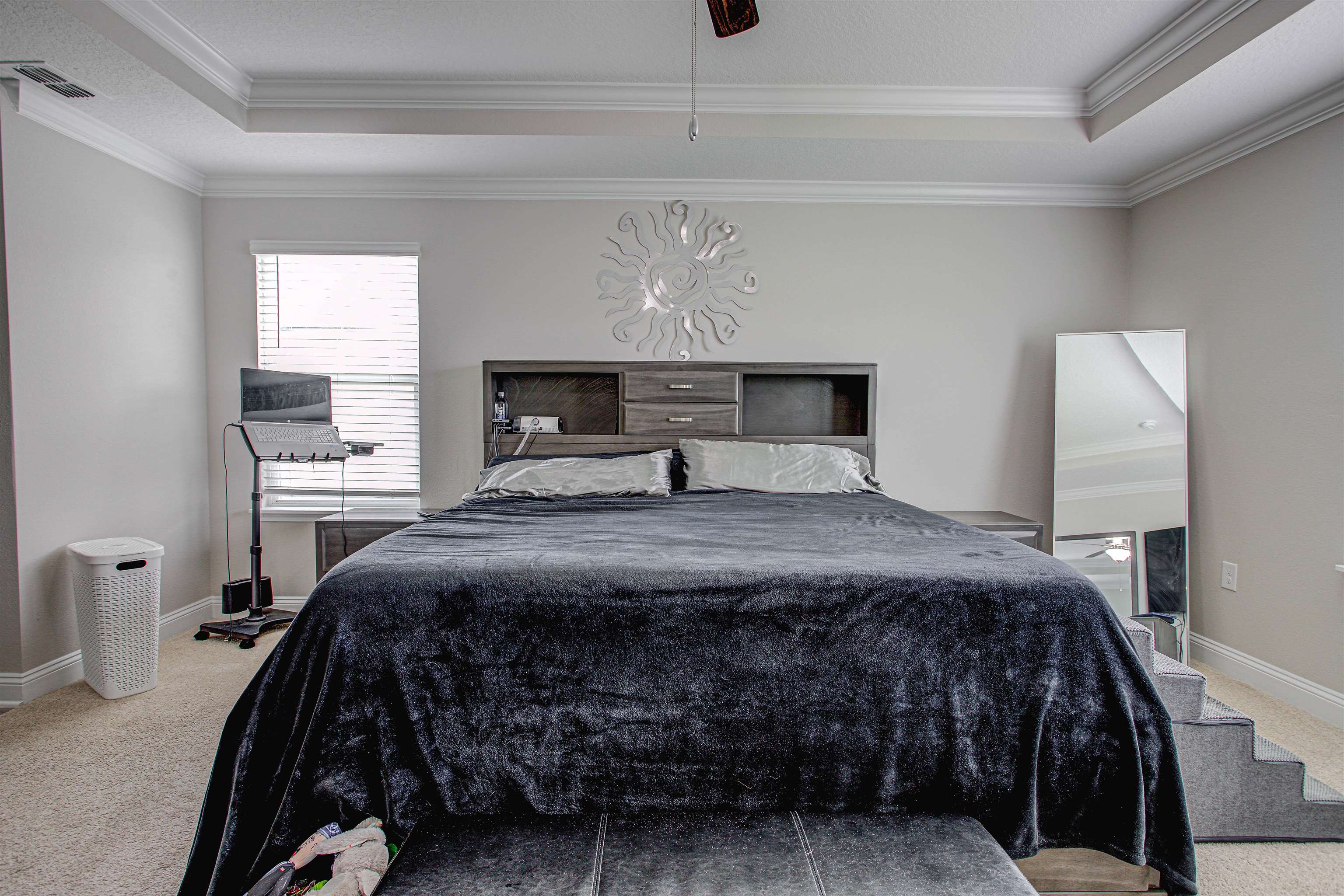 721 Narvarez Avenue St. Augustine, FL 32084 - Photo 18 of 59 Carpeted bedroom featuring a raised ceiling, ornamental molding, and ceiling fan
