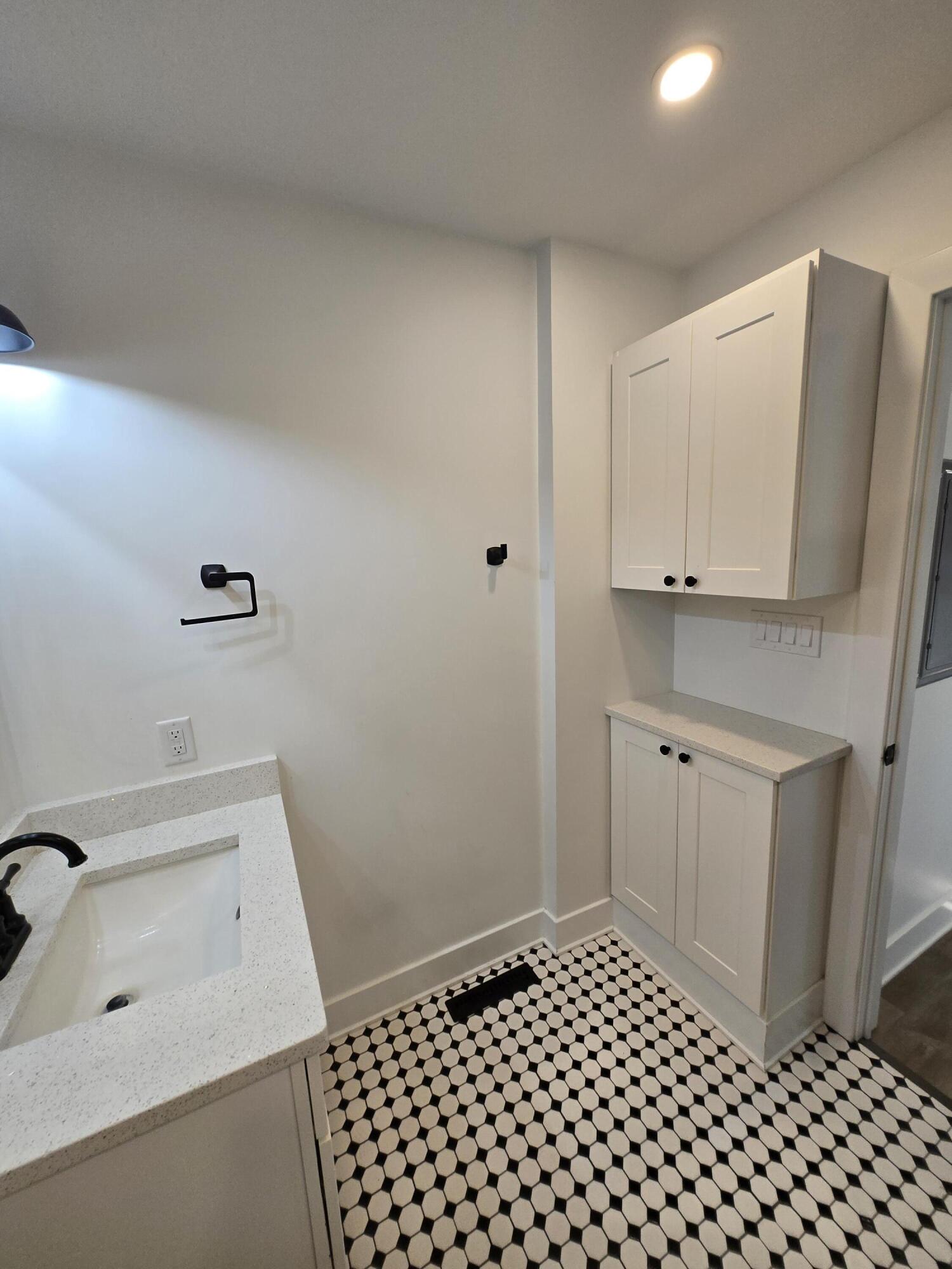 506 Locust Street Valparaiso, IN 46383 - Photo 18 of 34 a bathroom with a sink and a mirror