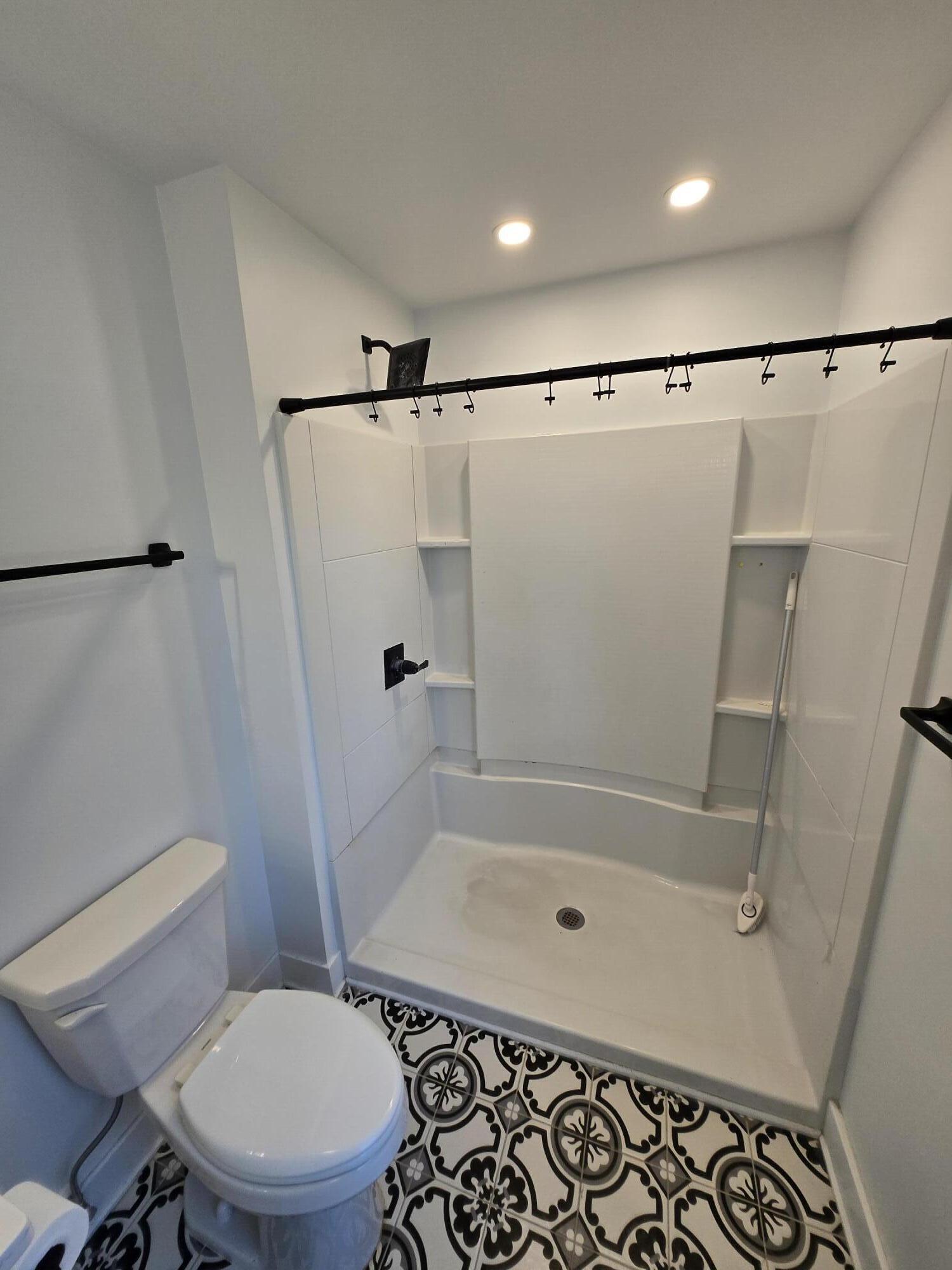 506 Locust Street Valparaiso, IN 46383 - Photo 23 of 34 a bathroom with a sink toilet and shower