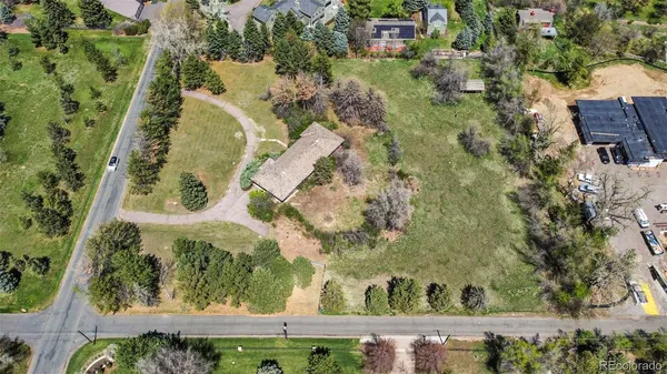 an aerial view of residential house with outdoor space