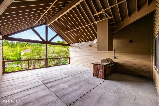 a view of backyard with tub