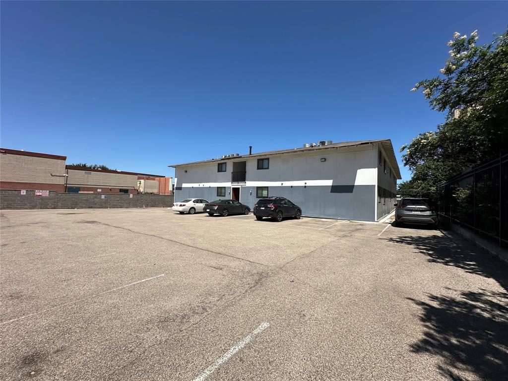 4526 Munger Avenue, Unit 208 Dallas, TX 75204 - Photo 16 of 19 a view of a road with a building in the background