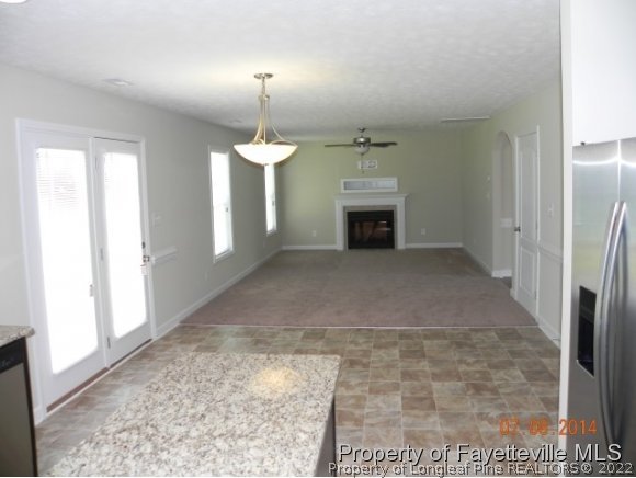 2651 Rockfish Road Raeford, NC 28376 - Photo 7 of 21 a view of a livingroom with a fireplace