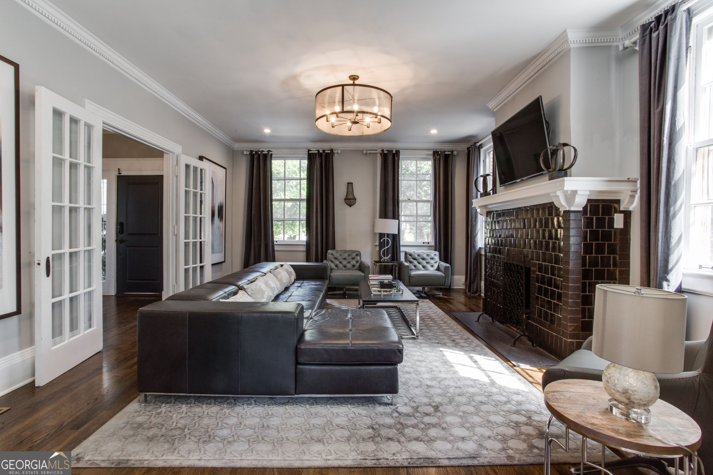 524 Seminole Avenue Northeast Atlanta, GA 30307 - Photo 13 of 75 a living room with furniture fireplace and a flat screen tv