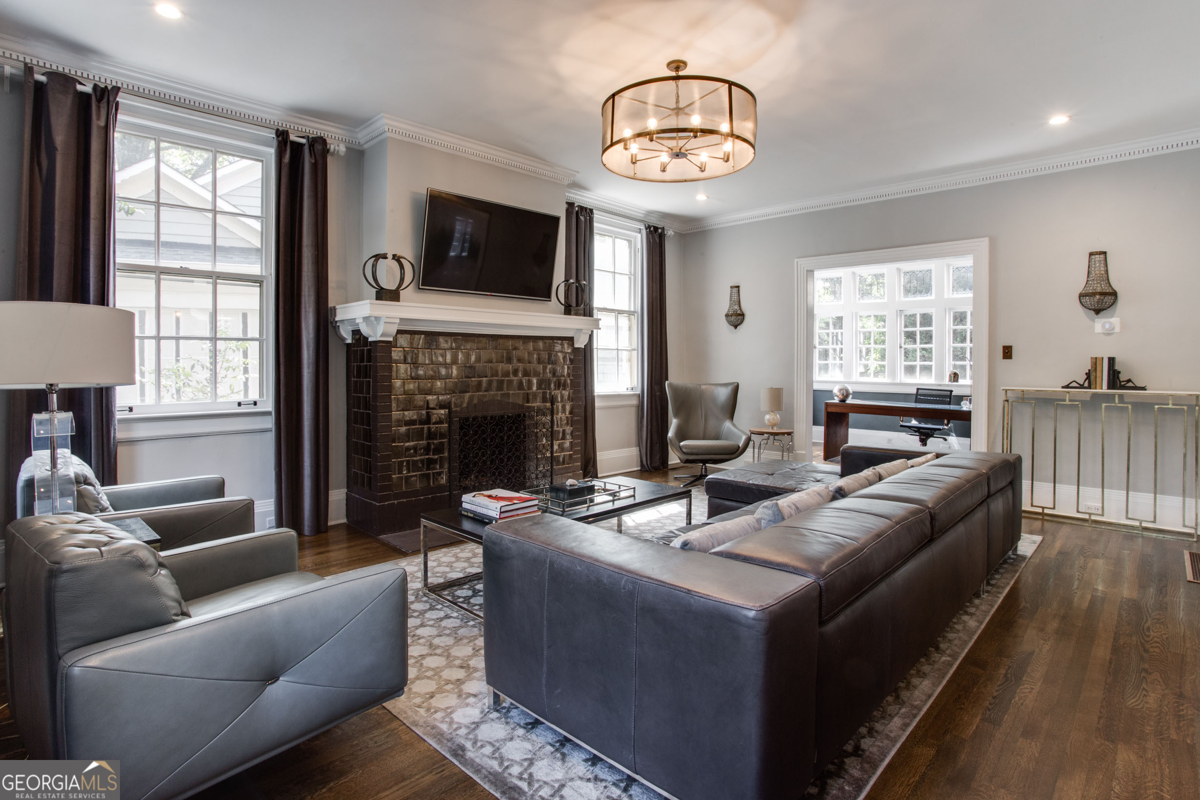 524 Seminole Avenue Northeast Atlanta, GA 30307 - Photo 15 of 75 a living room with furniture fireplace and a flat screen tv