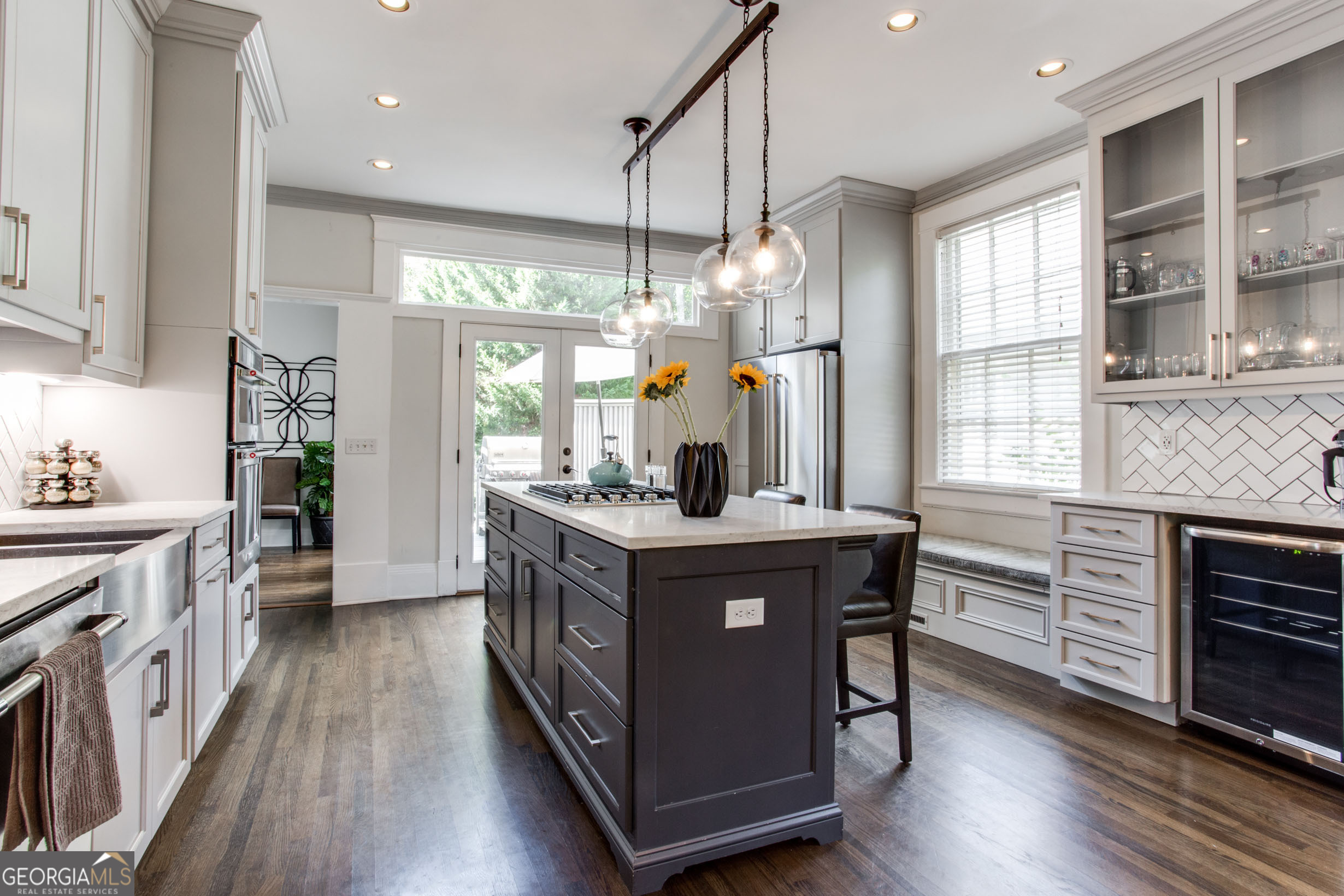 524 Seminole Avenue Northeast Atlanta, GA 30307 - Photo 21 of 75 a kitchen with stainless steel appliances granite countertop a stove and a large window