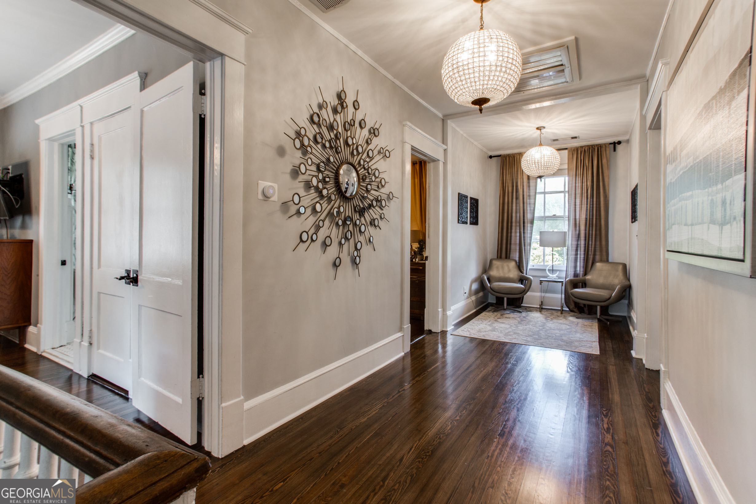 524 Seminole Avenue Northeast Atlanta, GA 30307 - Photo 27 of 75 a view of a hallway with wooden floor and a living room