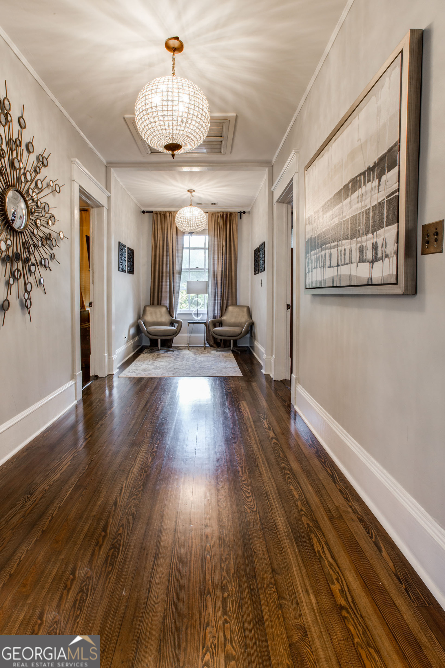524 Seminole Avenue Northeast Atlanta, GA 30307 - Photo 28 of 75 a view of a livingroom with wooden floor and a ceiling fan