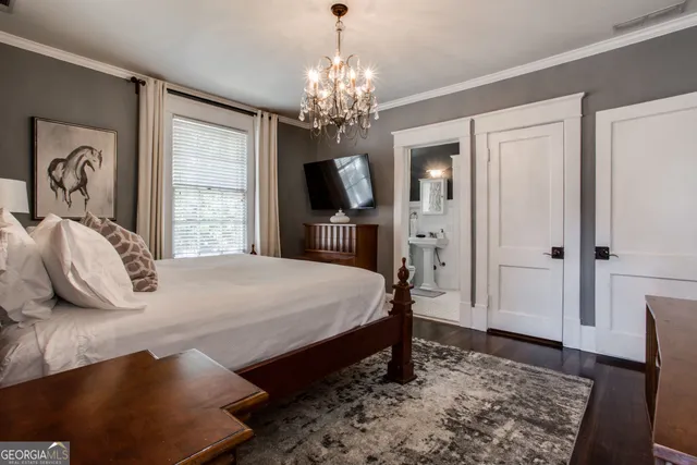 a kitchen with stainless steel appliances a stove sink microwave and cabinets