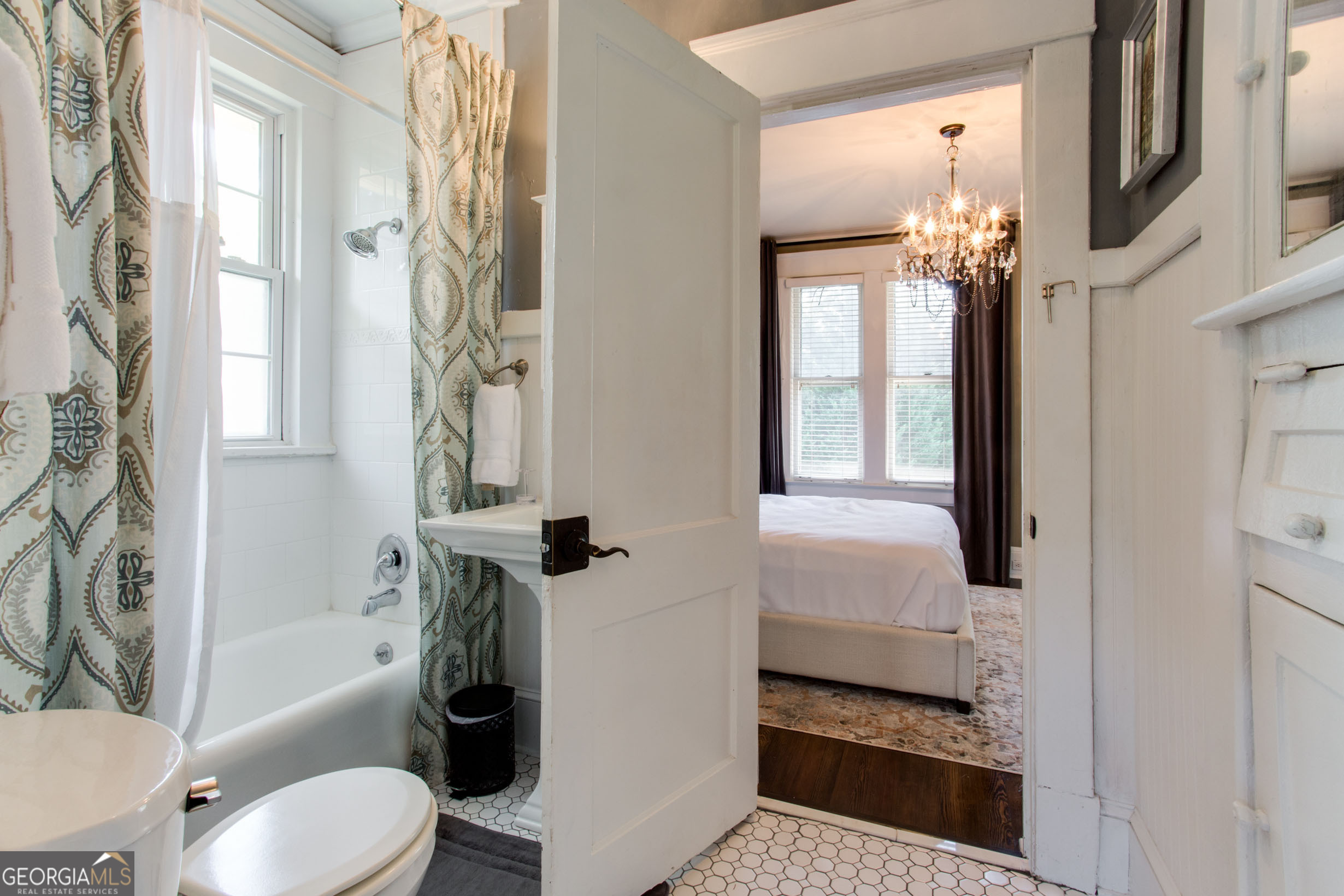524 Seminole Avenue Northeast Atlanta, GA 30307 - Photo 42 of 75 a bathroom with a tub shower sink and toilet