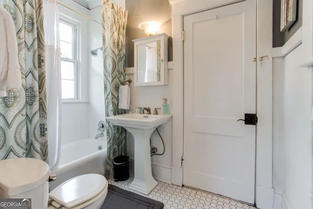 a view of swimming pool with a patio