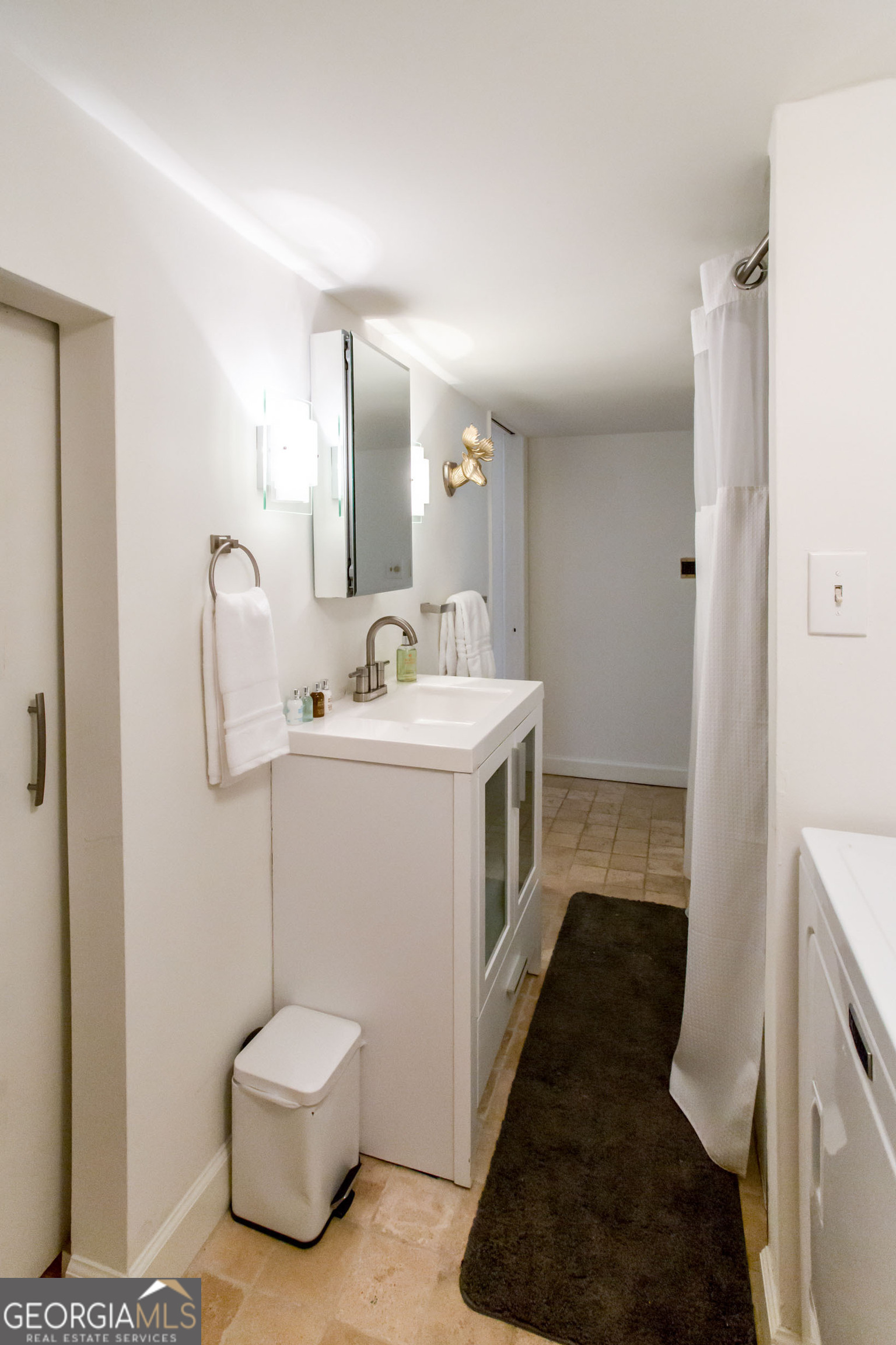 524 Seminole Avenue Northeast Atlanta, GA 30307 - Photo 59 of 75 a bathroom with a sink a toilet and mirror