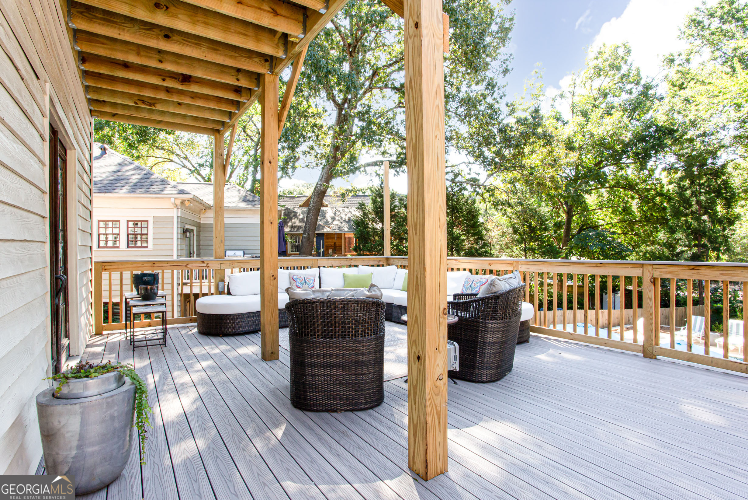524 Seminole Avenue Northeast Atlanta, GA 30307 - Photo 60 of 75 a view of balcony with couch and wooden floor