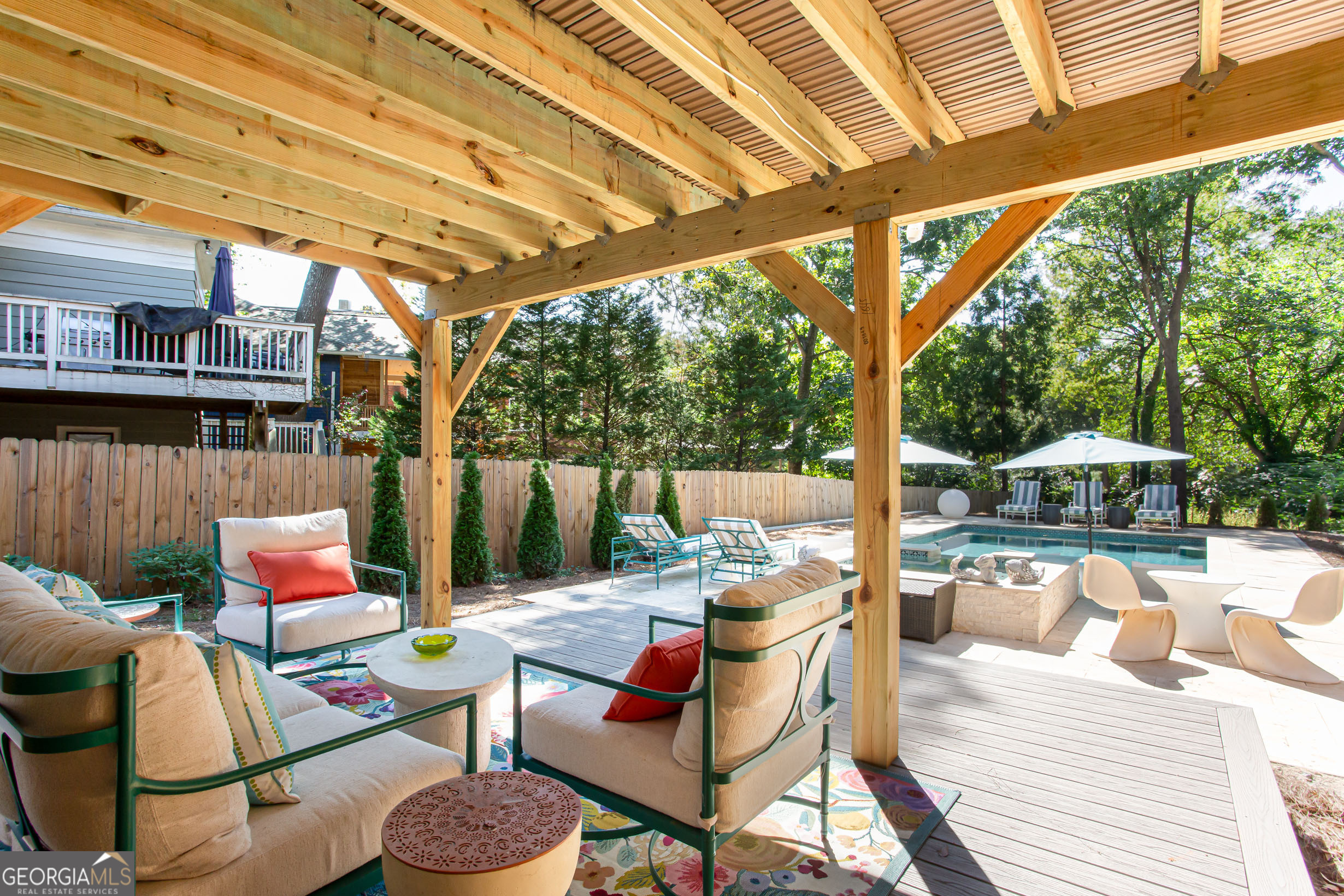 524 Seminole Avenue Northeast Atlanta, GA 30307 - Photo 72 of 75 a outdoor space with the couches and dining table with the garden view