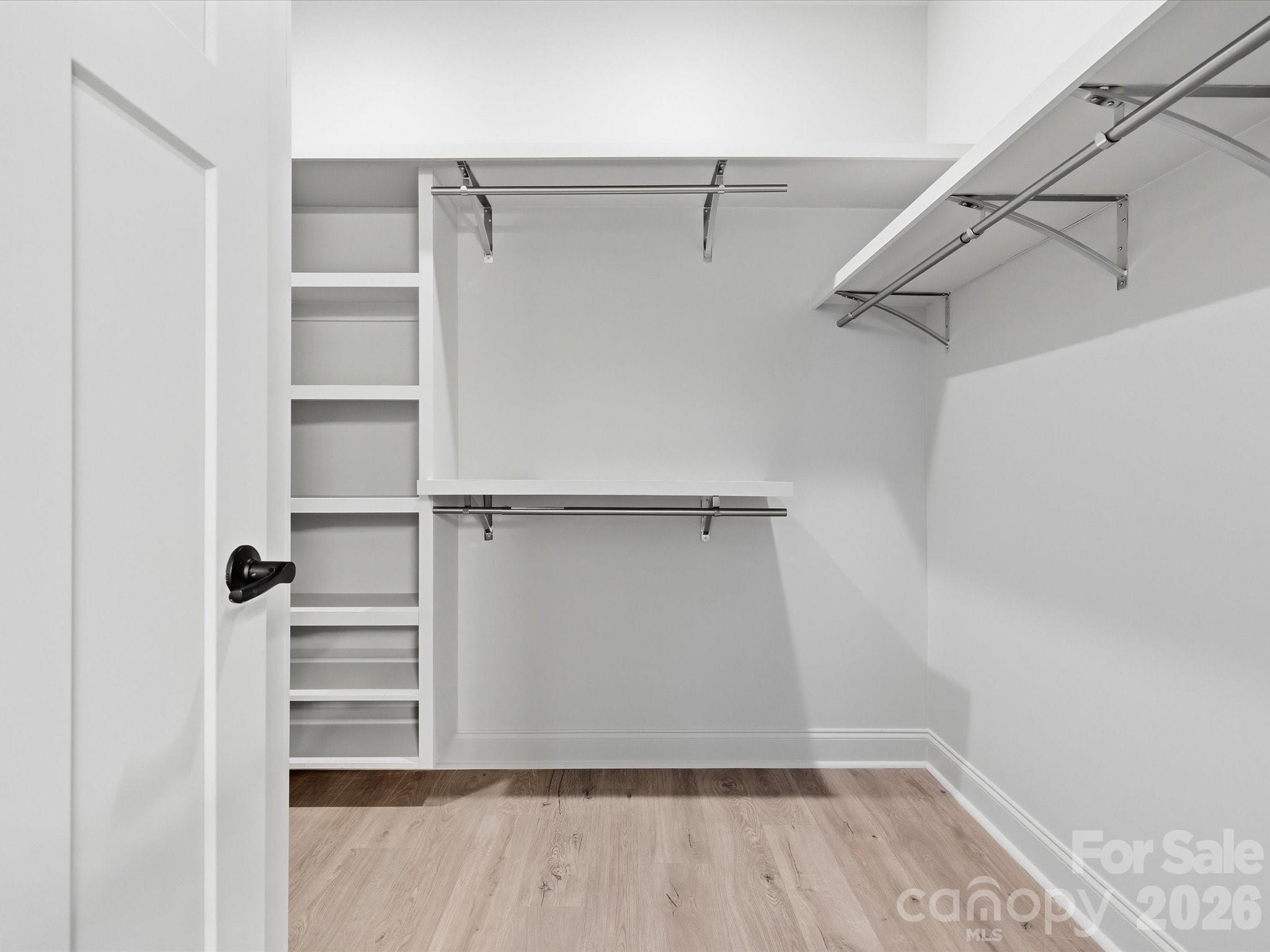 1491 Cedar Grove Road Clover, SC 29710 - Photo 28 of 48 a view of walk in closet with empty racks