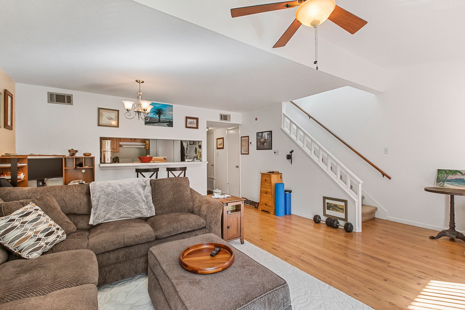 6029 Old Fredericksburg Road, Unit A Austin, TX 78749 - Photo 17 of 20 a living room with furniture and a wooden floor