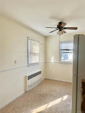 a view of a window in an empty room