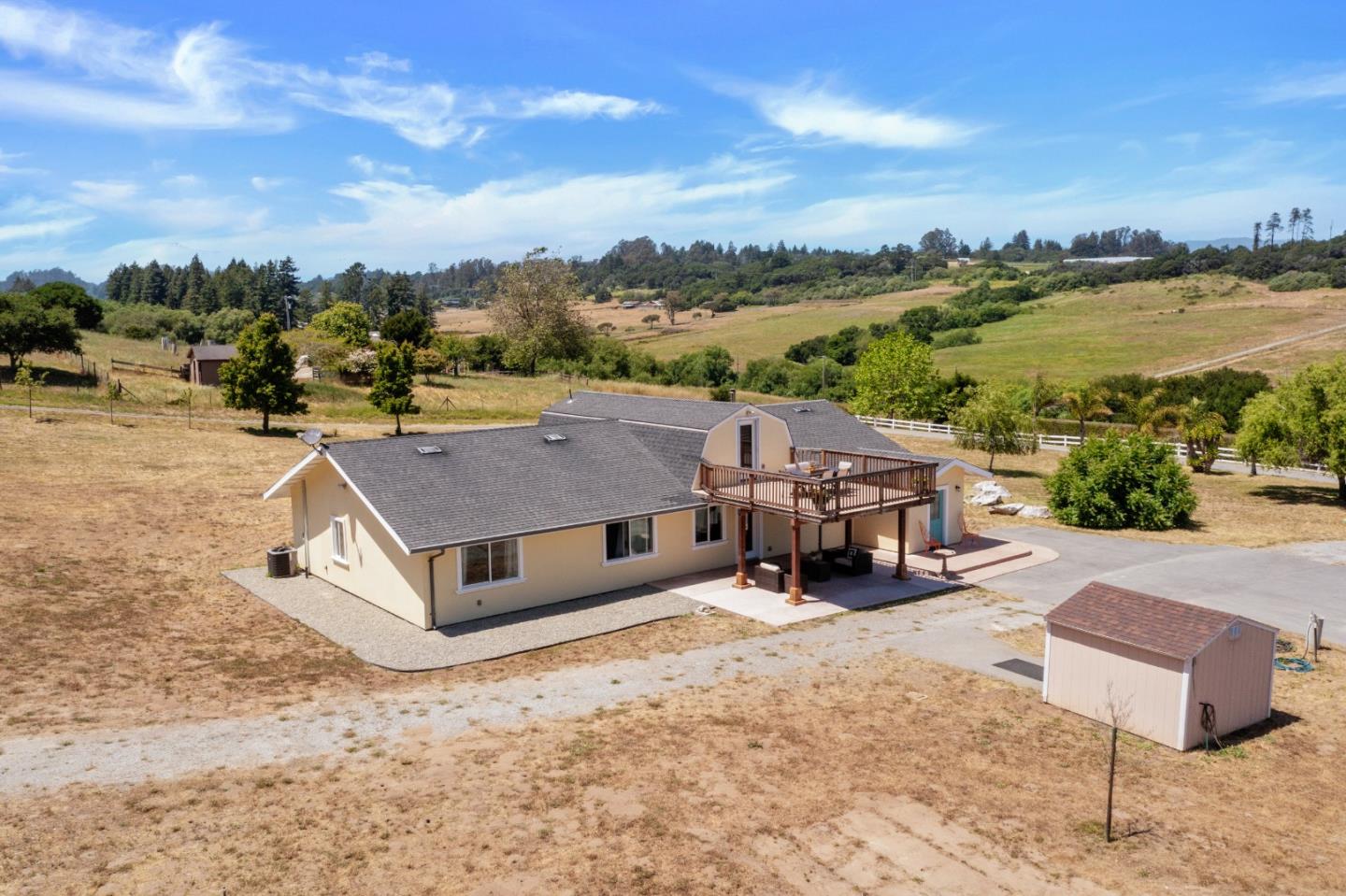 490 Carson Lane Watsonville, CA 95076 - Photo 8 of 38 a aerial view of a house with big yard and large trees