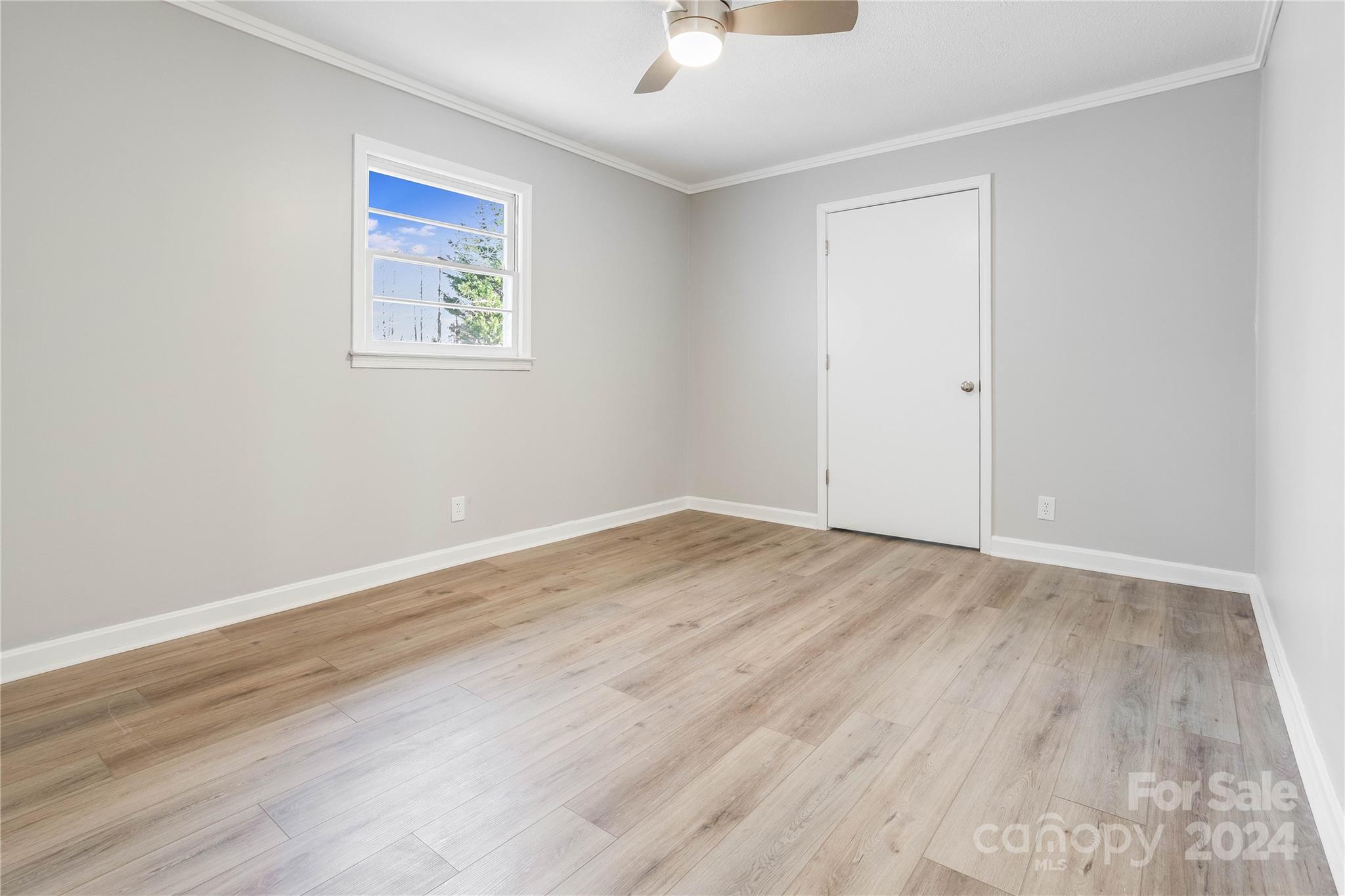 410 Holly Hills Road Dallas, NC 28034 - Photo 13 of 27 a view of empty room with wooden floor