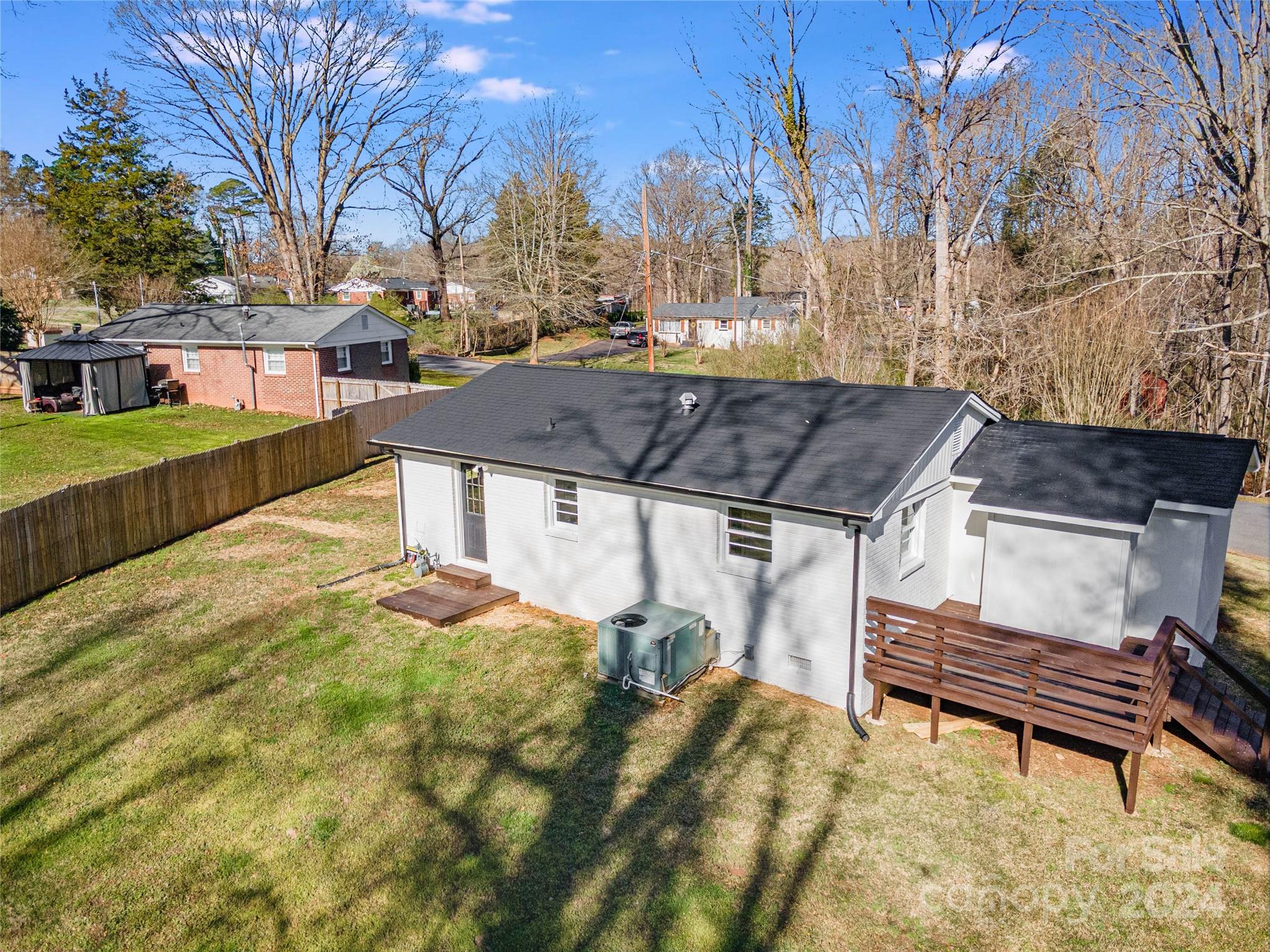 410 Holly Hills Road Dallas, NC 28034 - Photo 25 of 27 a view of a patio with a yard