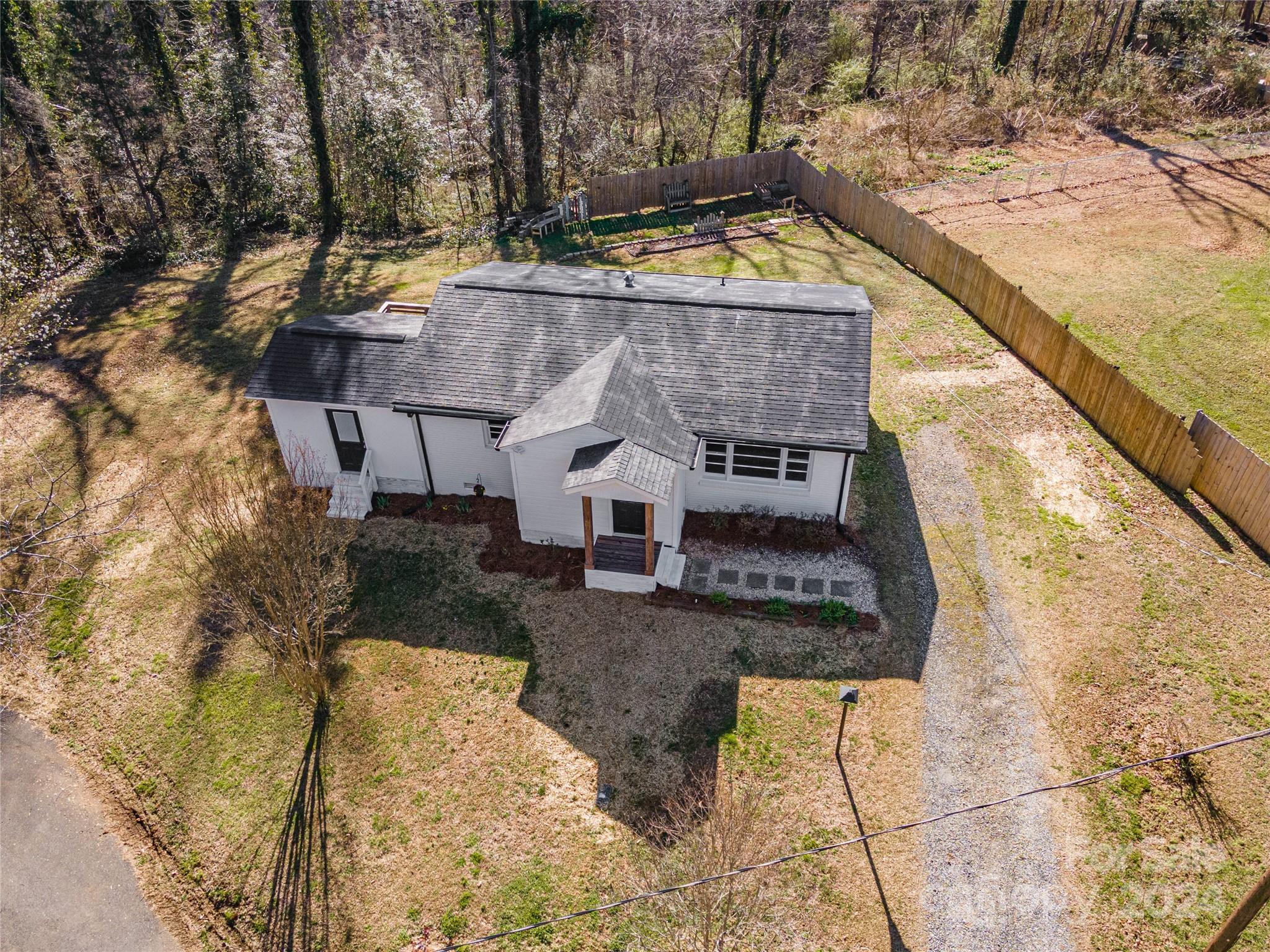410 Holly Hills Road Dallas, NC 28034 - Photo 27 of 27 a view of house with outdoor space