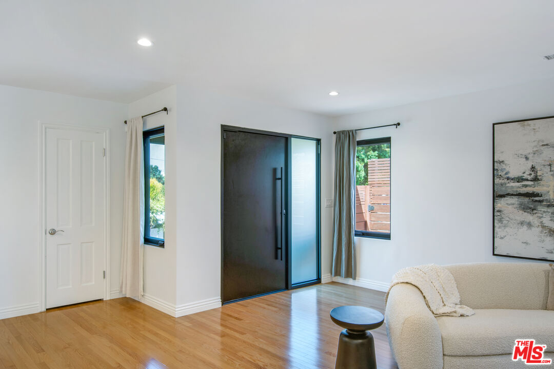 3558 Muirfield Road South Los Angeles, CA 90016 - Photo 18 of 23 a view of livingroom with furniture and window