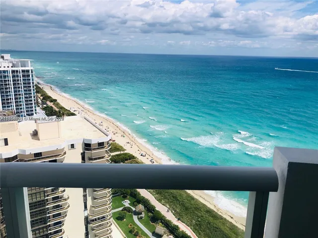 a view of a balcony with an outdoor space