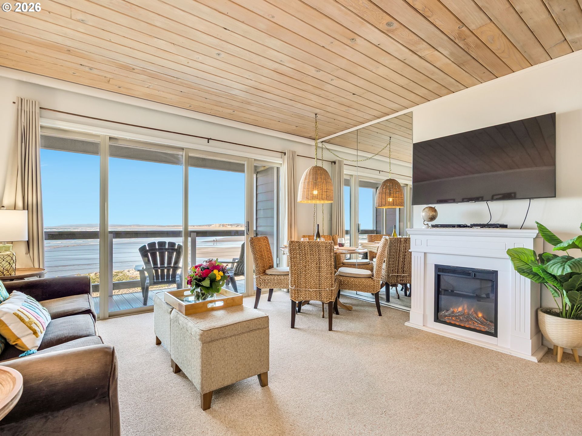 3140 Sunset Boulevard, Unit 36 Seaside, OR 97138 - Photo 11 of 41 a living room with furniture and a fireplace