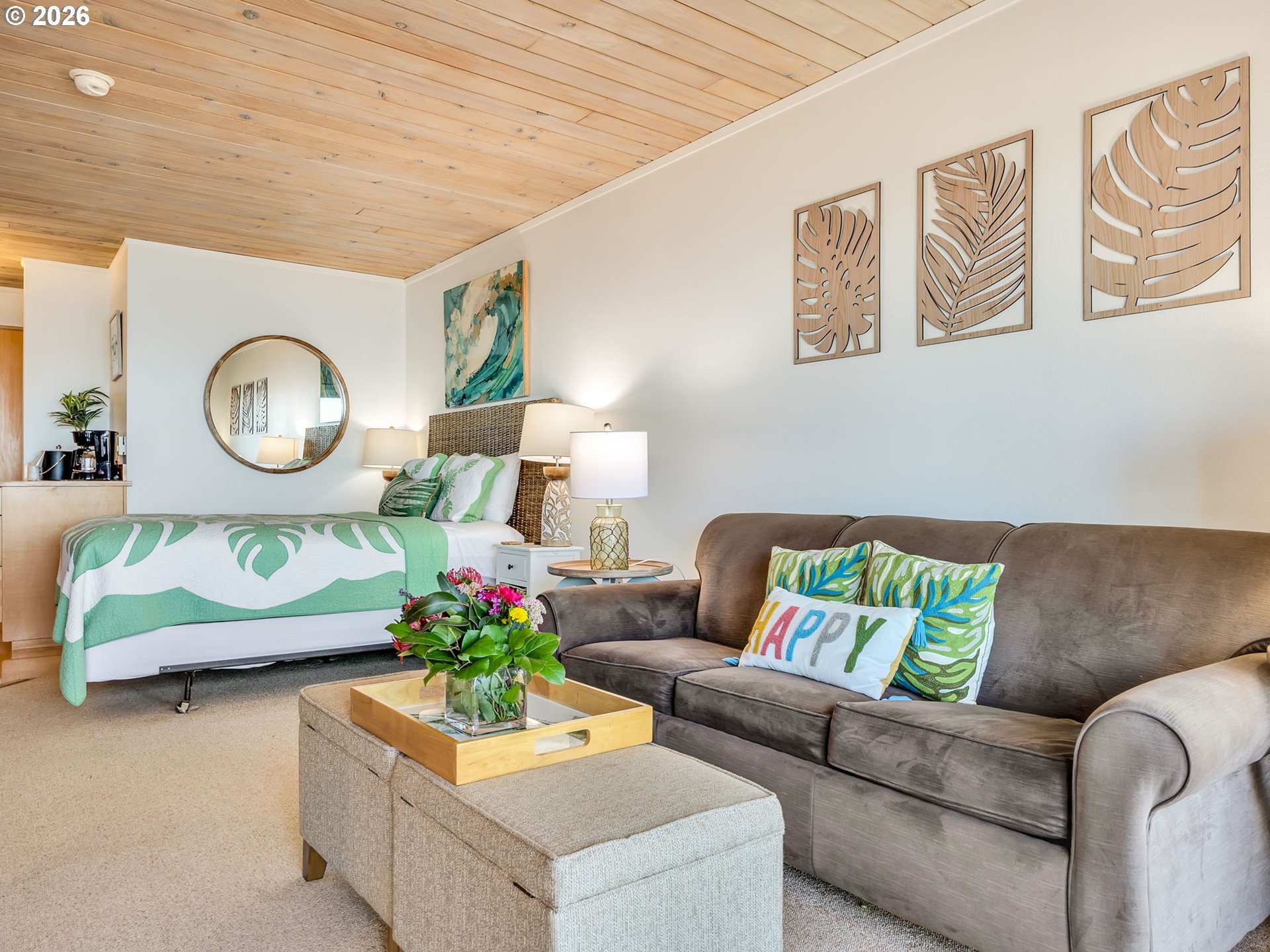 3140 Sunset Boulevard, Unit 36 Seaside, OR 97138 - Photo 15 of 41 a living room with furniture and wall paintings