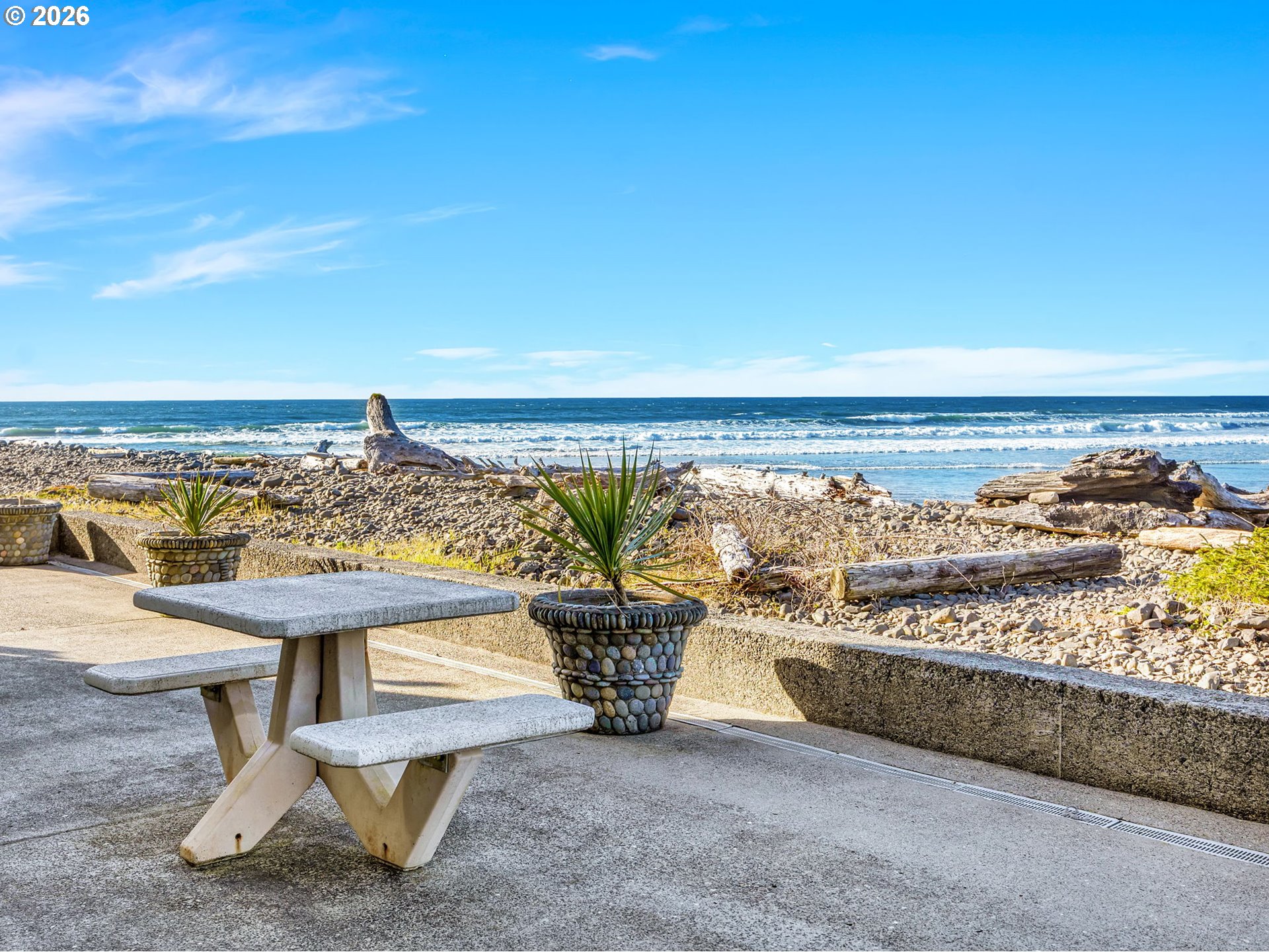 3140 Sunset Boulevard, Unit 36 Seaside, OR 97138 - Photo 29 of 41 a view of a terrace with lawn chairs
