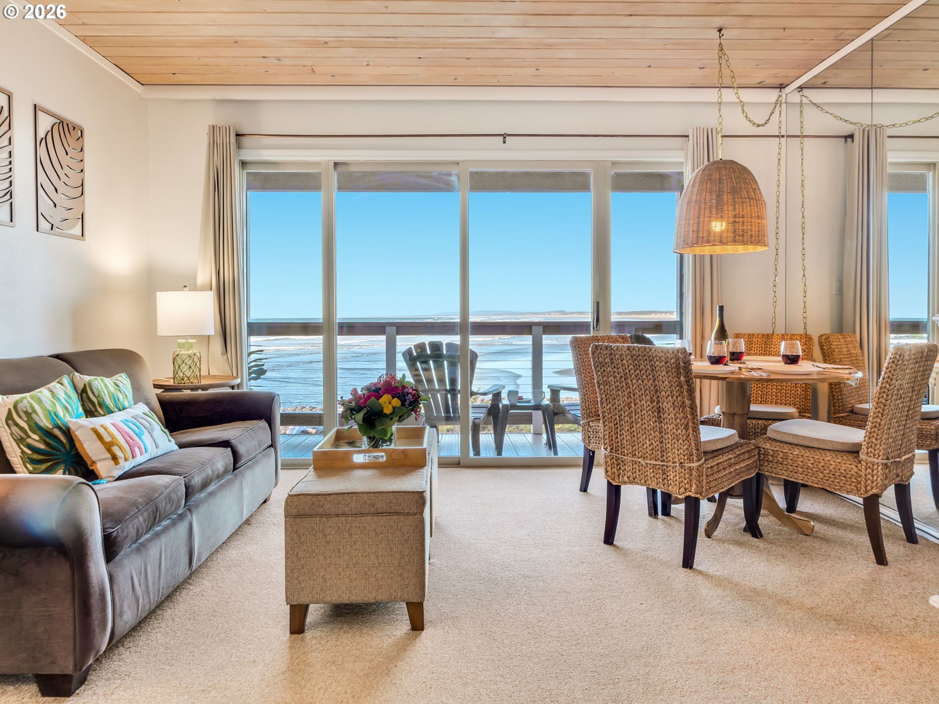 3140 Sunset Boulevard, Unit 36 Seaside, OR 97138 - Photo 4 of 41 a living room with furniture and a large window