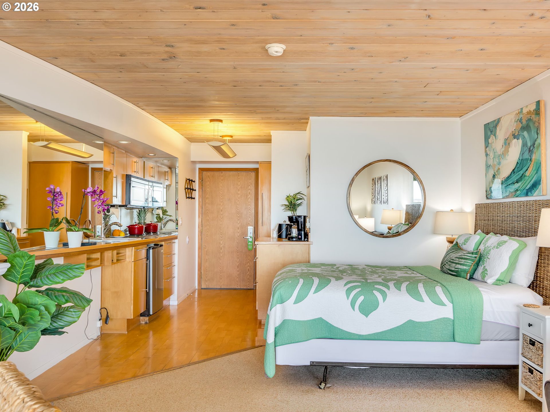 3140 Sunset Boulevard, Unit 36 Seaside, OR 97138 - Photo 8 of 41 a bedroom with a bed and a large window