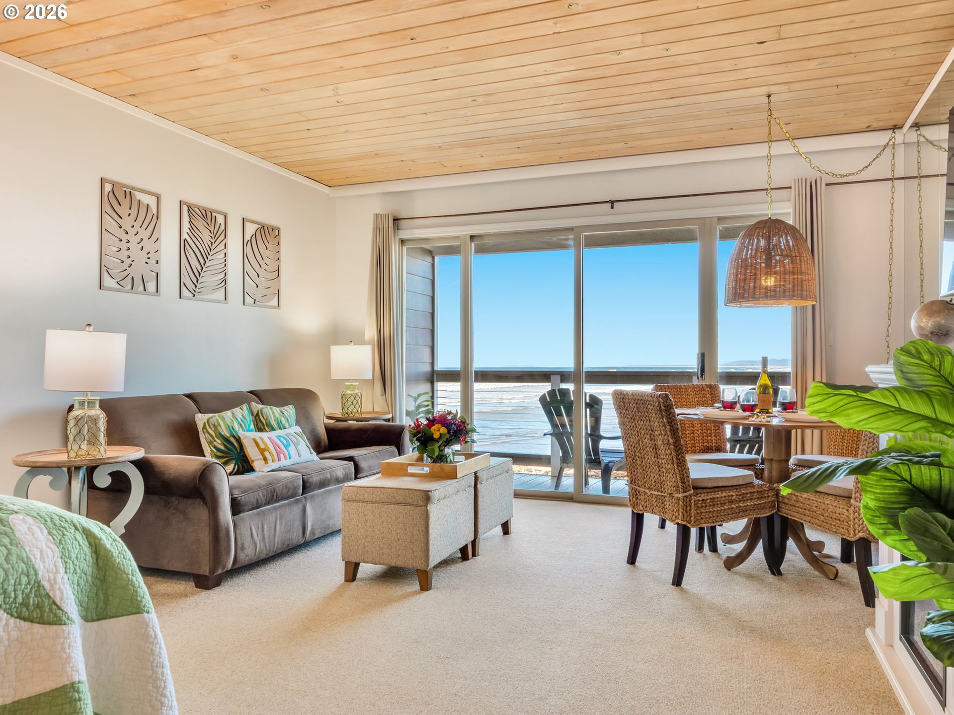 3140 Sunset Boulevard, Unit 36 Seaside, OR 97138 - Photo 9 of 41 a living room with furniture and a large window