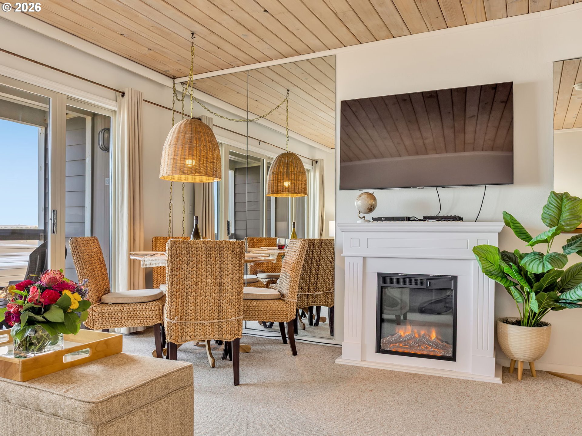 3140 Sunset Boulevard, Unit 36 Seaside, OR 97138 - Photo 10 of 41 a living room with furniture and a fireplace