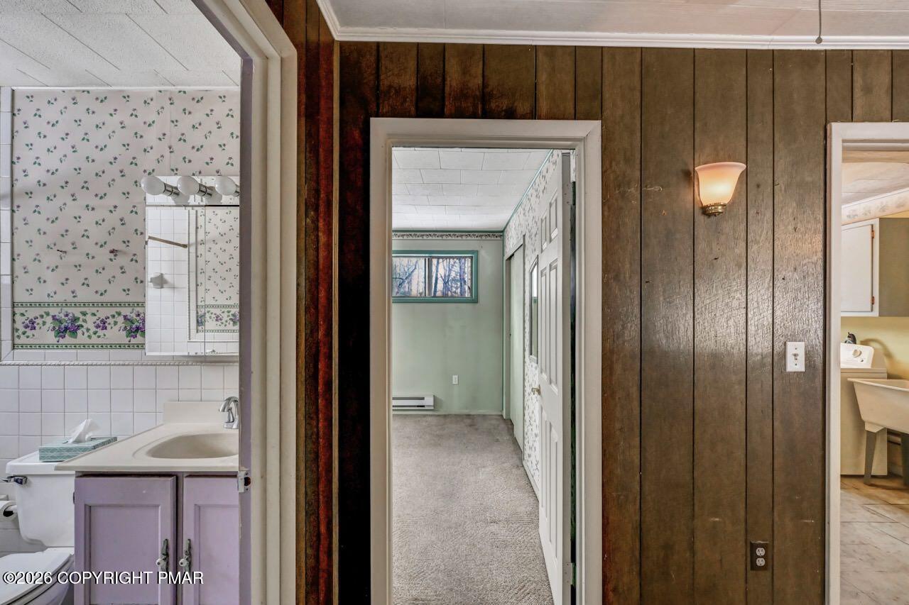 1912 Johns Road Effort, PA 18330 - Photo 23 of 44 a view of a bathroom with a sink and a mirror